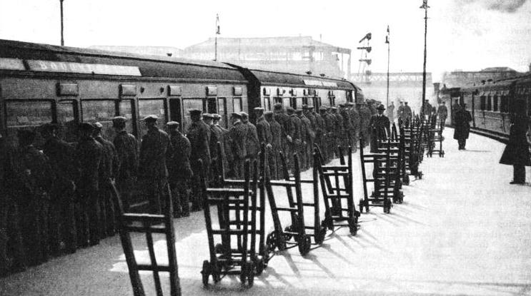Porters awaiting the arrival of a train at Waterloo