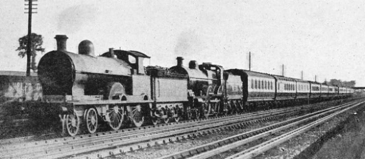 A London and North Western Engine “piloting” a Midland Engine on a Manchester Express