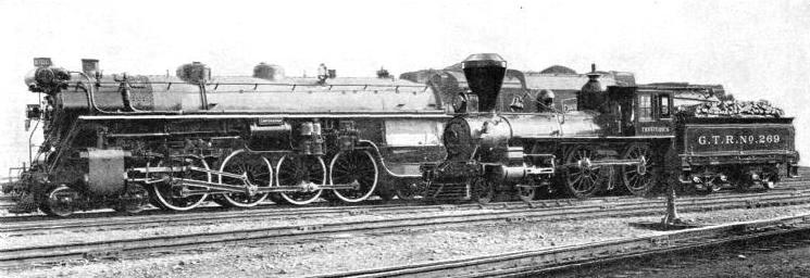 An early Canadian locomotive, “Trevithick”, standing by the Canadian National Railways’ 4-8-4 express engine “Confederation”