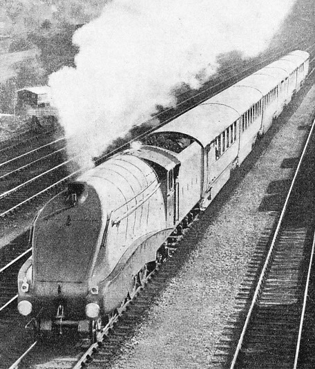 A remarkable photograph of the “Silver Jubilee” climbing past New Barnet at a speed of nearly 75 miles an hour during the Experimental run