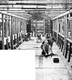 THE FRAMEWORK of a passenger coach under construction at Swindon