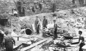 AN UNUSUAL METHOD of disposing of soil excavated during the laying of foundations for buildings in Chicago is provided by the freight tunnels