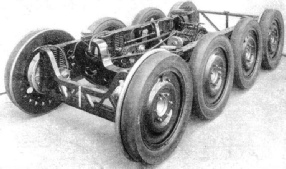 THE EIGHT-WHEELED BOGIE UNIT of the 1934 Micheline 56-seater rail-car.