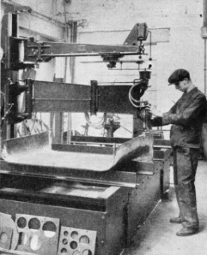 AN OXYGEN CUTTING-MACHINE AT WORK