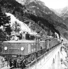 A heavy freight train on the mountainous Mittenwald line