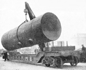 A cylindrical load requires particularly secure attachment to the bogie wagon