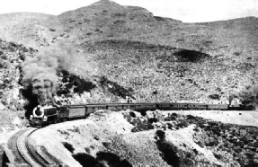 The railway overcomes the slopes of the mighty Matrooseberg by means of the Hex River Pass