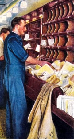 Sorters at work in a mail sorting coach