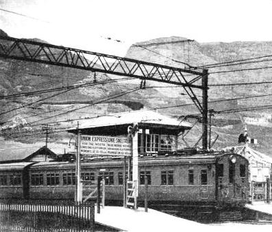 ON THE CAPE TOWN SUBURBAN LINE, a train at Monument Station