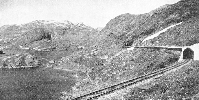 Stout snow-sheds of the type shown here are necessary on the Oslo-Bergen route