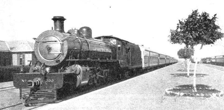 KHARTOUM STATION, with its wide platforms pleasantly laid out with trees,