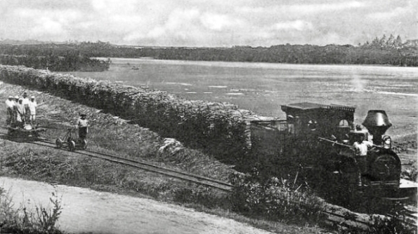 A Hudswell Clarke 0-6-0 locomotive hauling a train of sugar cane to one of the factories on Fiji