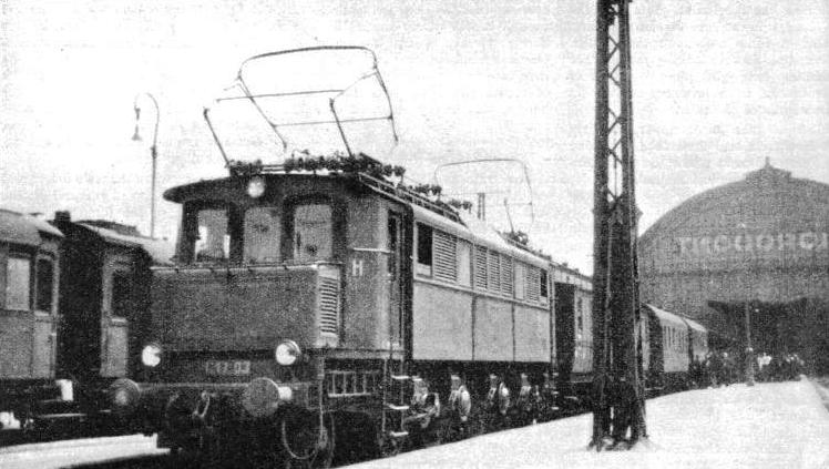 FROM STUTTGART TO SALZBURG, the "Orient Express" is hauled by a German State Railway electric locomotive