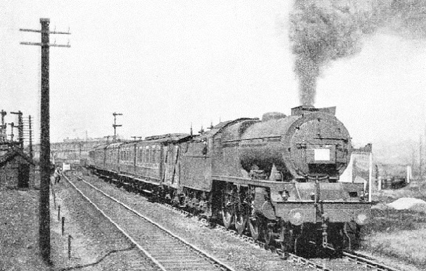 AS AN EXPERIMENT, small smoke-deflectors were fitted to the LMS engine, “Royal Scot”
