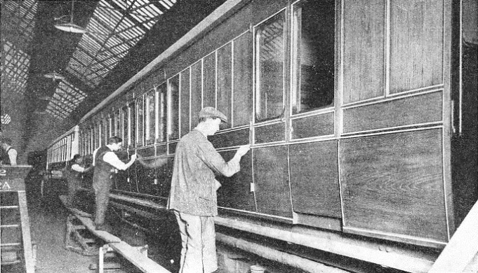 men at work “lining” a carriage at the LNER shops at York