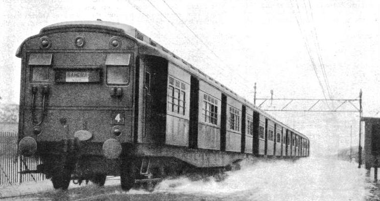 OVER FLOODED LINES caused by the heavy rains of the monsoons at Bombay