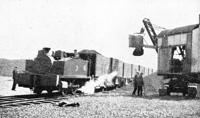 A SMALL TANK LOCOMOTIVE at work on the industrial railway at Beckton Essex, belonging to the Gas Light and Coke Company
