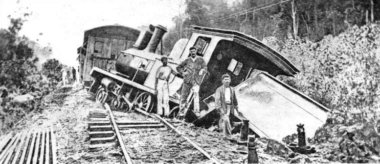 A local train which has been derailed by collision with an elephant in Malaya