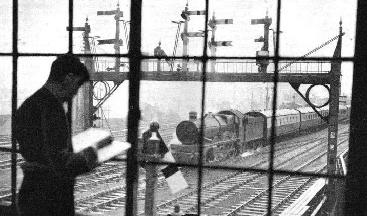 A SIGNAL GANTRY viewed from a signal-box at Reading