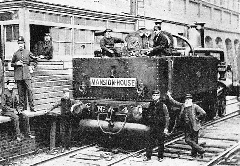 one of the old-time steam locomotives of the District railway at Mansion House Station