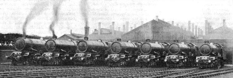 A magnificent line of “Kings” outside their engine-sheds ready for service