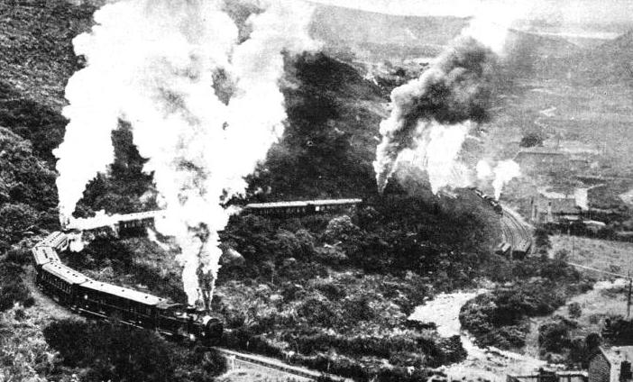 The royal train, carrying H.R.H. the Duke of Gloucester, ascending the famous incline up the Rimutaka Mountains