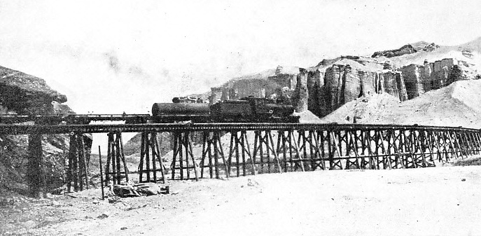 This picture illustrates in a very striking manner one of the chief problems confronting railway engineers in the desert - the transport of water