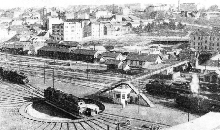 IN BELGRADE. A view of the locomotive depot and of a new turn-table outside the engine-sheds