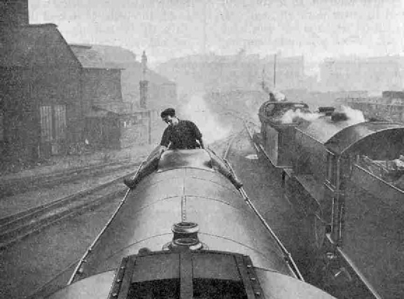 Cleaning the outside of the boiler of the Flying Scotsman