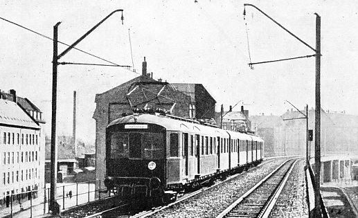 An electric train entering Norrebro from Varlose in the direction of Helierup, on the Copenhagen suburban lines
